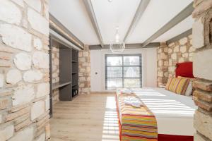 Postel nebo postele na pokoji v ubytování Alp Pasa Fiore Garden Suites - Special Class
