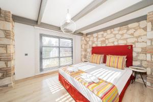 Postel nebo postele na pokoji v ubytování Alp Pasa Fiore Garden Suites - Special Class