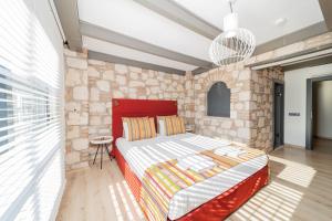 Postel nebo postele na pokoji v ubytování Alp Pasa Fiore Garden Suites - Special Class