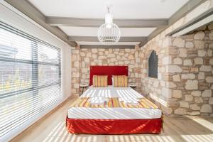 Postel nebo postele na pokoji v ubytování Alp Pasa Fiore Garden Suites - Special Class