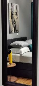 A bed or beds in a room at Elegant Seaside 2 Floor Apartment