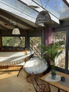 Balkón nebo terasa v ubytování Le Manoir des Sens - Forêt de Bergheim