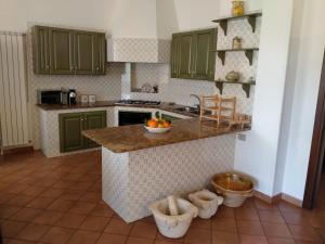 Kuchyňa alebo kuchynka v ubytovaní Casa Donna Razietta - Natura e relax