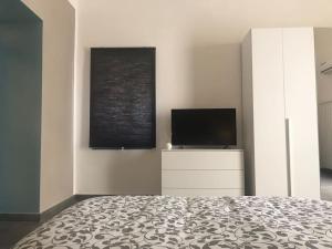 TV a/nebo společenská místnost v ubytování ILNONSOLO- Near Oplonti Ruins