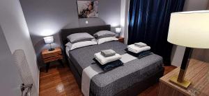 A bed or beds in a room at Elegant Seaside 2 Floor Apartment