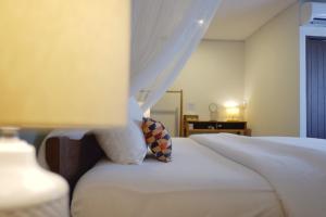 Postel nebo postele na pokoji v ubytování Inn Oon Villa