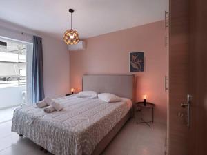 Postelja oz. postelje v sobi nastanitve Pagrati cozy apartment in Athens