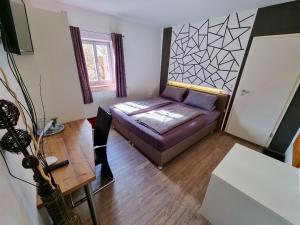 Postel nebo postele na pokoji v ubytování Gasthof Goldener Stern