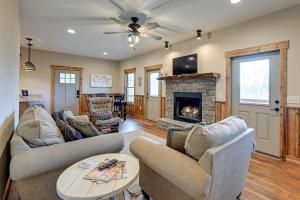 a living room with two couches and a fireplace at Smoky Mountain Cabin Rental Game Room, Fire Pit! in Andrews