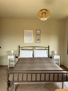 Een bed of bedden in een kamer bij B&B Domus Vista