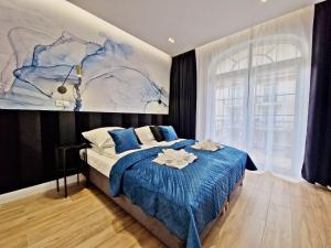 Ein Bett oder Betten in einem Zimmer der Unterkunft Baltic Home