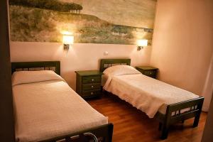 Letto o letti in una camera di Sale Hotel