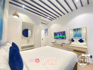 TV a/nebo společenská místnost v ubytování Riverside Mini Hotel Grand World Phu Quoc