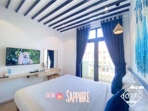 TV a/nebo společenská místnost v ubytování Riverside Mini Hotel Grand World Phu Quoc