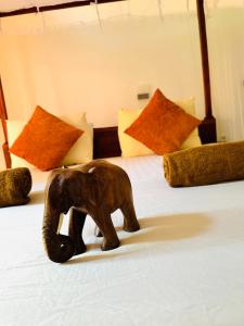 Letto o letti in una camera di Mango Tree House