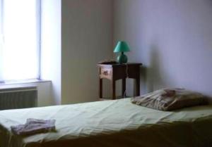 Posteľ alebo postele v izbe v ubytovaní Maison de charme en campagne à Arlempdes avec jardin