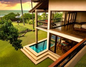 an aerial view of a house with a swimming pool at Wattura Resort & Spa in Negombo