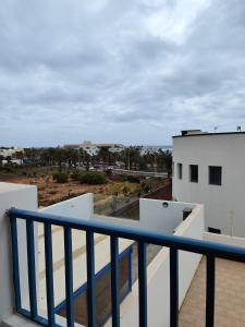 a view from the balcony of a house at Acogedor Apartamento Residencial in Costa Teguise