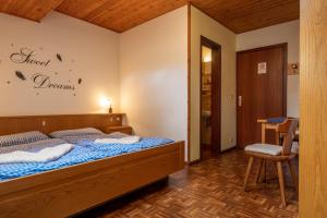 Postel nebo postele na pokoji v ubytování Appartements Pension Sonia