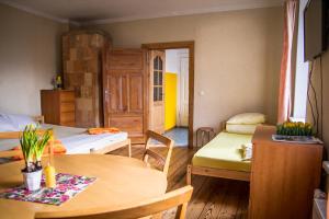 Ένα ή περισσότερα κρεβάτια σε δωμάτιο στο Medainie apartamenti