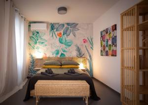 Кровать или кровати в номере Calefati up