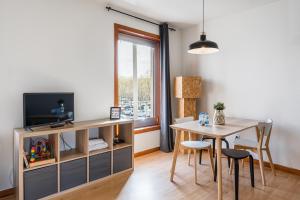 Et tv og/eller underholdning på Coreto Apartment