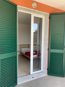 Postel nebo postele na pokoji v ubytování RTA La Pineta