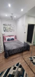 Posteľ alebo postele v izbe v ubytovaní Apartman Julija 1