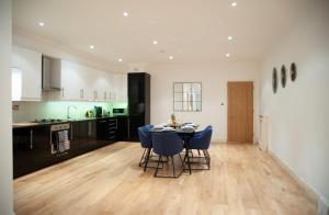 Kuchyňa alebo kuchynka v ubytovaní Spacious & Unique Flat in Hoxton - 2 bed