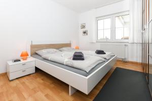 Postel nebo postele na pokoji v ubytování Ferienwohnung Kapitän