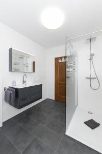 Ένα μπάνιο στο Ferienwohnung Kapitän