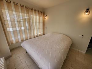 Postel nebo postele na pokoji v ubytování Les Pénates Corréziennes