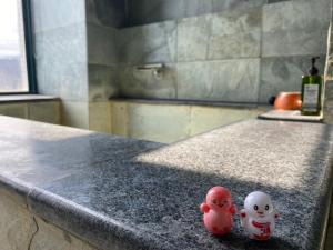 Foto sihtkohas Jiaoxi asuva majutusasutuse 旗溫泉民宿 galeriist