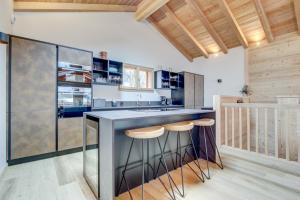 Kuchyňa alebo kuchynka v ubytovaní Chalet Tilly