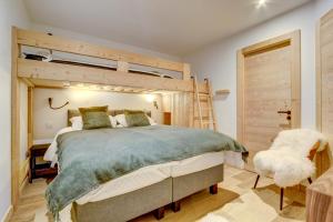 Posteľ alebo postele v izbe v ubytovaní Chalet Tilly