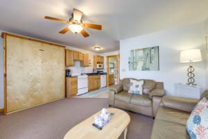 a living room with a couch and a table at Wells Vacation Rental about 1 Mi to Beach Access! in Wells