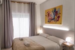 Postel nebo postele na pokoji v ubytování Apartamentos Turísticos Centro Histórico, by CartagenaSpain