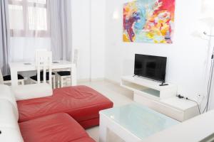 TV a/nebo společenská místnost v ubytování Apartamentos Turísticos Centro Histórico, by CartagenaSpain + 37 fotografií