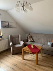 Posezení v ubytování Ferienwohnung Am Froschteich