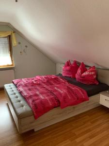 Postel nebo postele na pokoji v ubytování Ferienwohnung Am Froschteich