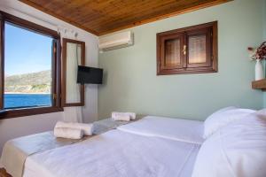 Кровать или кровати в номере Margaritas apartments
