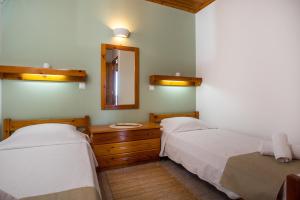 Кровать или кровати в номере Margaritas apartments