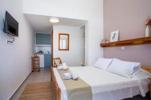 Кровать или кровати в номере Margaritas apartments
