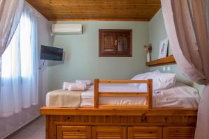 Кровать или кровати в номере Margaritas apartments
