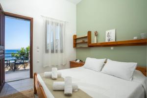 Кровать или кровати в номере Margaritas apartments