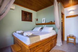 Кровать или кровати в номере Margaritas apartments