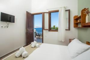 Кровать или кровати в номере Margaritas apartments