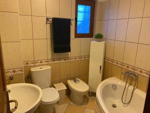 Koupelna v ubytování Maria Apartament + 26 fotografií