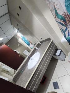 a bathroom with a sink and a counter with a sink at 2 bedroom luxury beach apartment with Full seaView in Ajman 