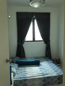 En eller flere senger på et rom på Penang Airport Executive Suites and Family Getaway, Sleeps 2-6
